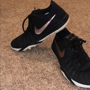 Rose gold and black Nike free 7